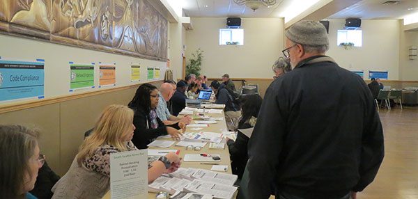 City staff helping people at the South Seattle Home Fair
