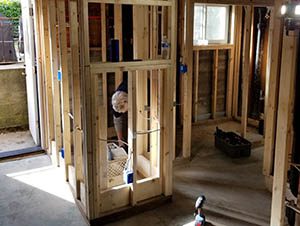 A contractor installing electrical wiring.