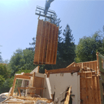 removing house walls to reuse as a shed.